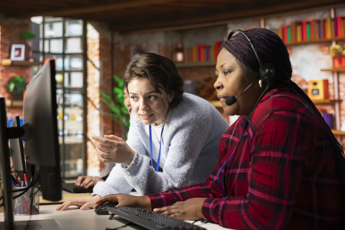 Cheerful call center onboarding specialist training worker