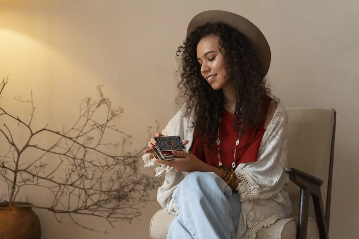 Side view woman reading tarot