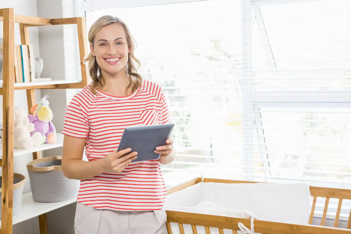 Woman holding digital tablet