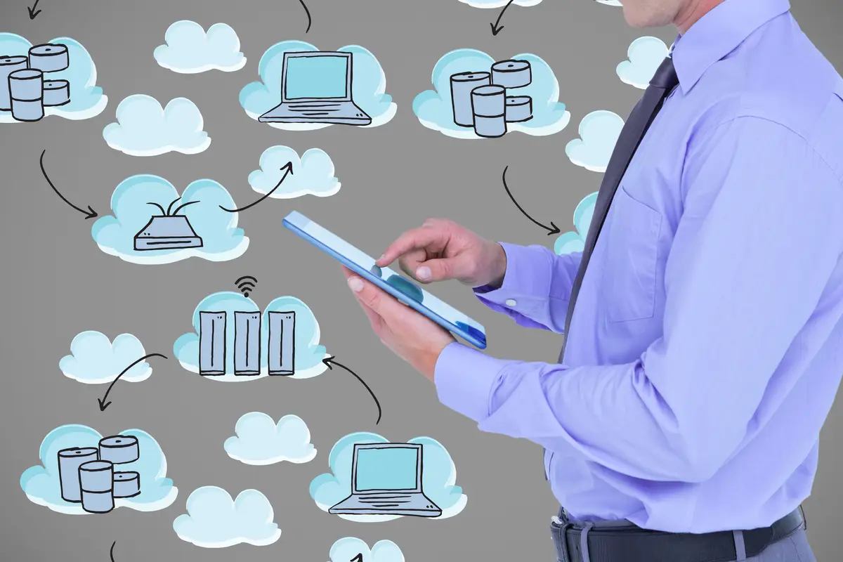 Man with a tablet and clouds background icons