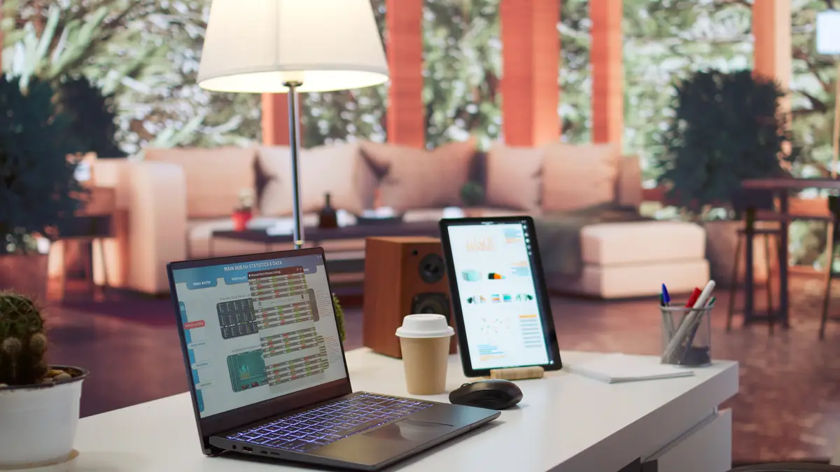 Empty home setup desk filled with documents and financial reports