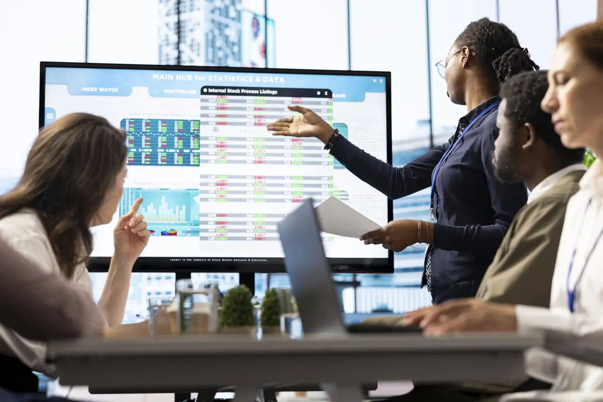 Employees gather to brainstorm ideas and create strategies in high end boardroom