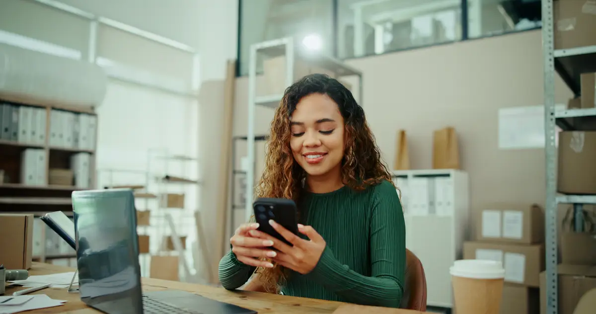 E commerce logistics and woman on smartphone for shipping distribution and small business courier service Delivery quality control and worker with email for online shopping supply chain or order