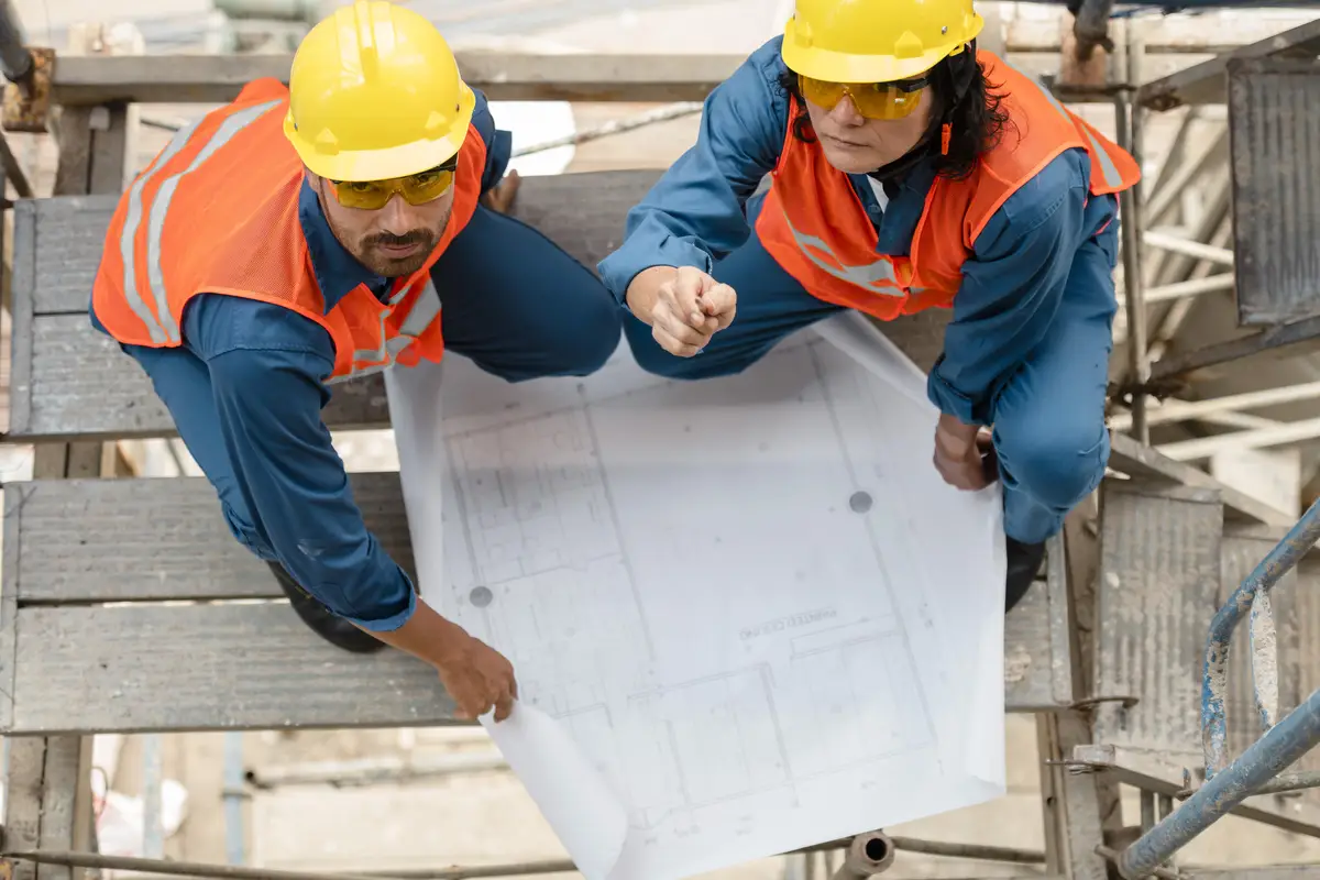 Top view employees with safety equipment