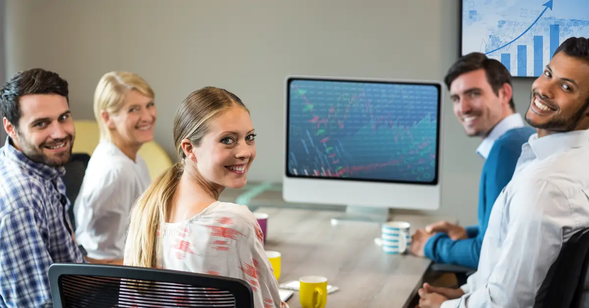Business executives sitting in conference room during meeting