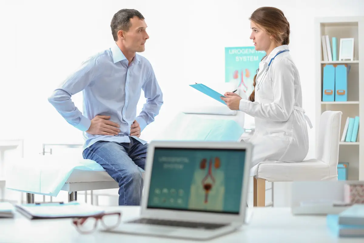 Man visiting doctor at hospital
