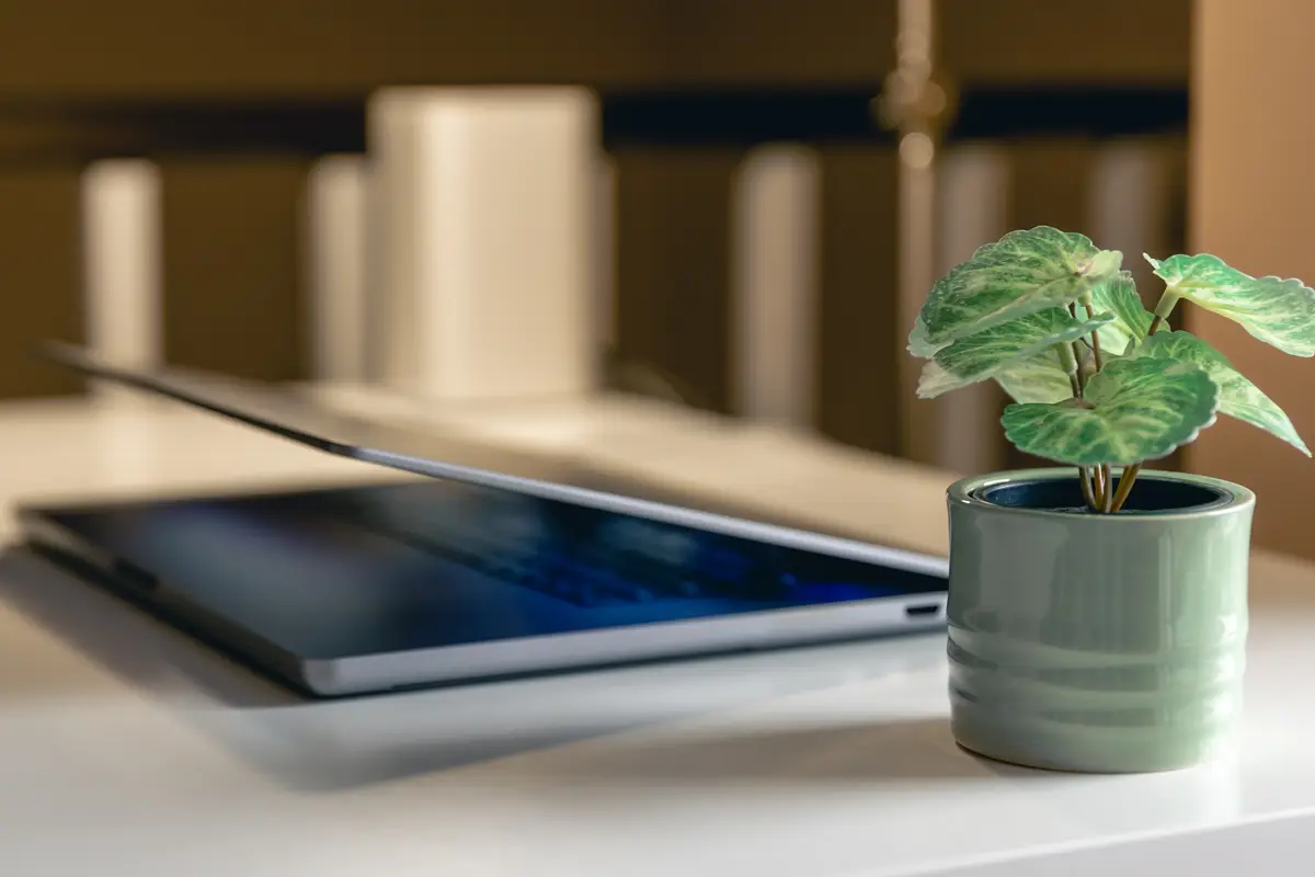 Laptop on the desktop on a blurred background