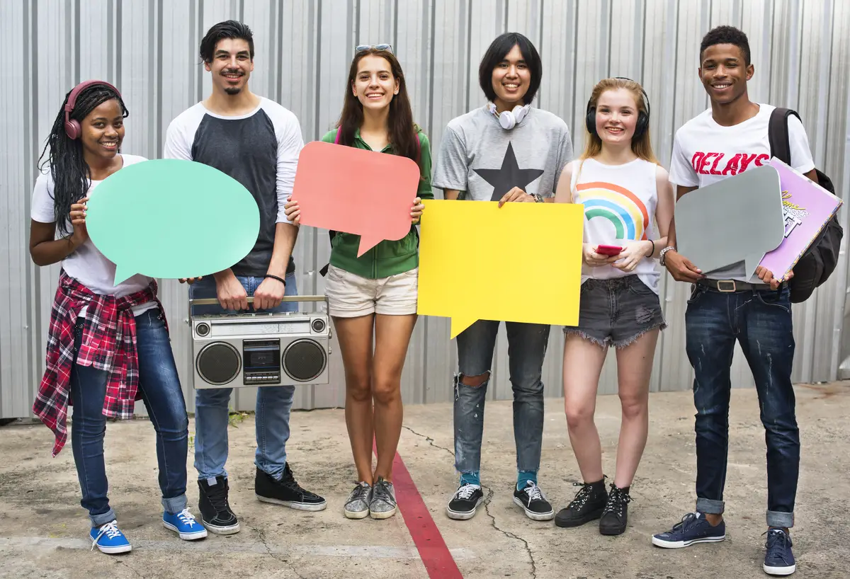 Diverse Group People Holding Speech Bubble Concept