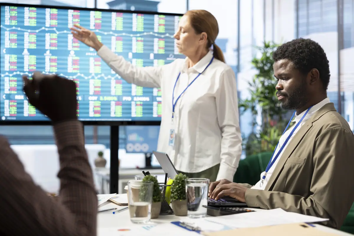 General manager making a presentation with infographics and sales numbers