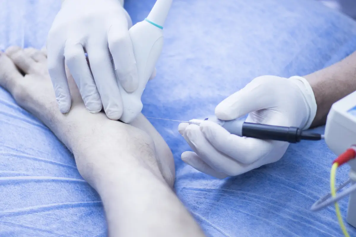 Cropped image of doctor operating patient in hospital