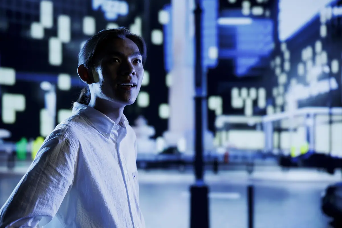 Man enjoys city skyscrapers at night