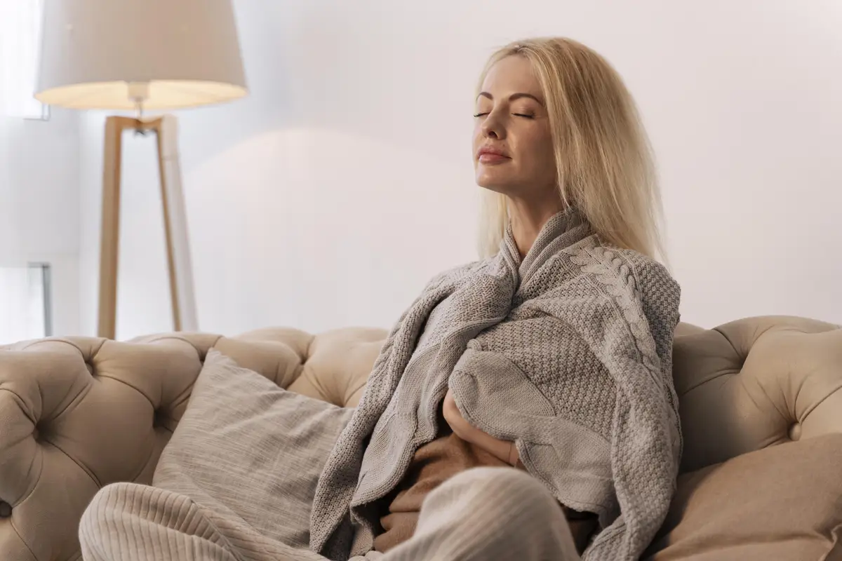 Close up on young adult enjoying home comfort