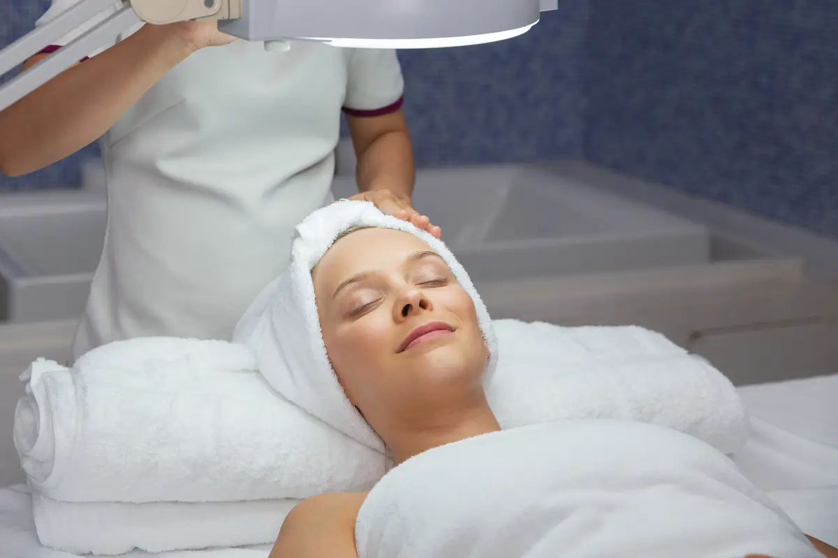 Woman lying in the massage room face up