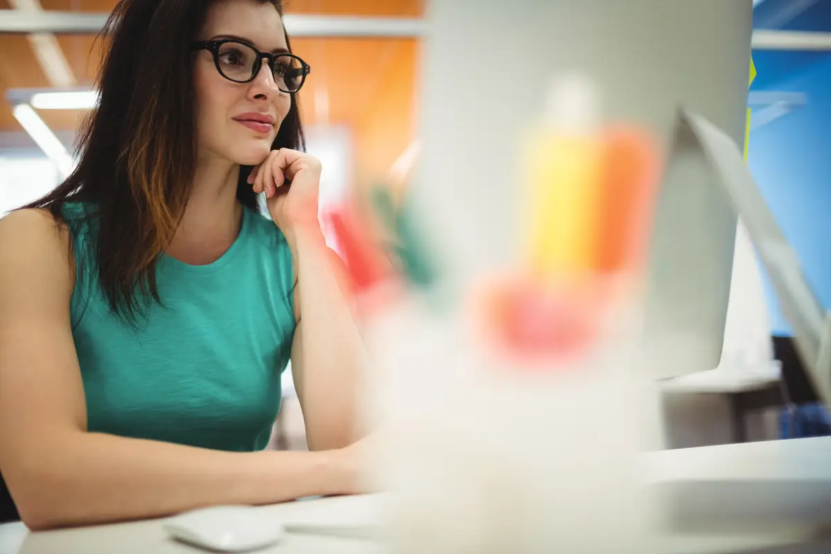 Beautiful female executive working at her desk