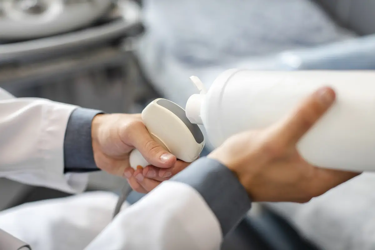 Doctor hands preparing a medical device to use