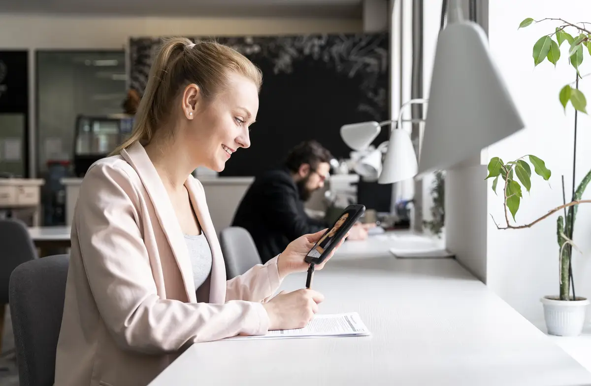 Medium shot workers at desk
