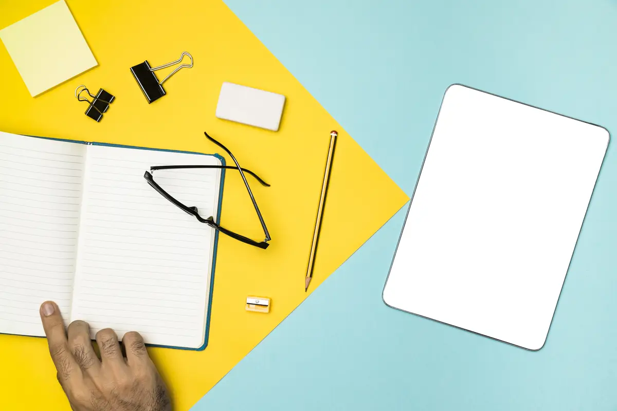 Top view  desk concept with mockup tablet