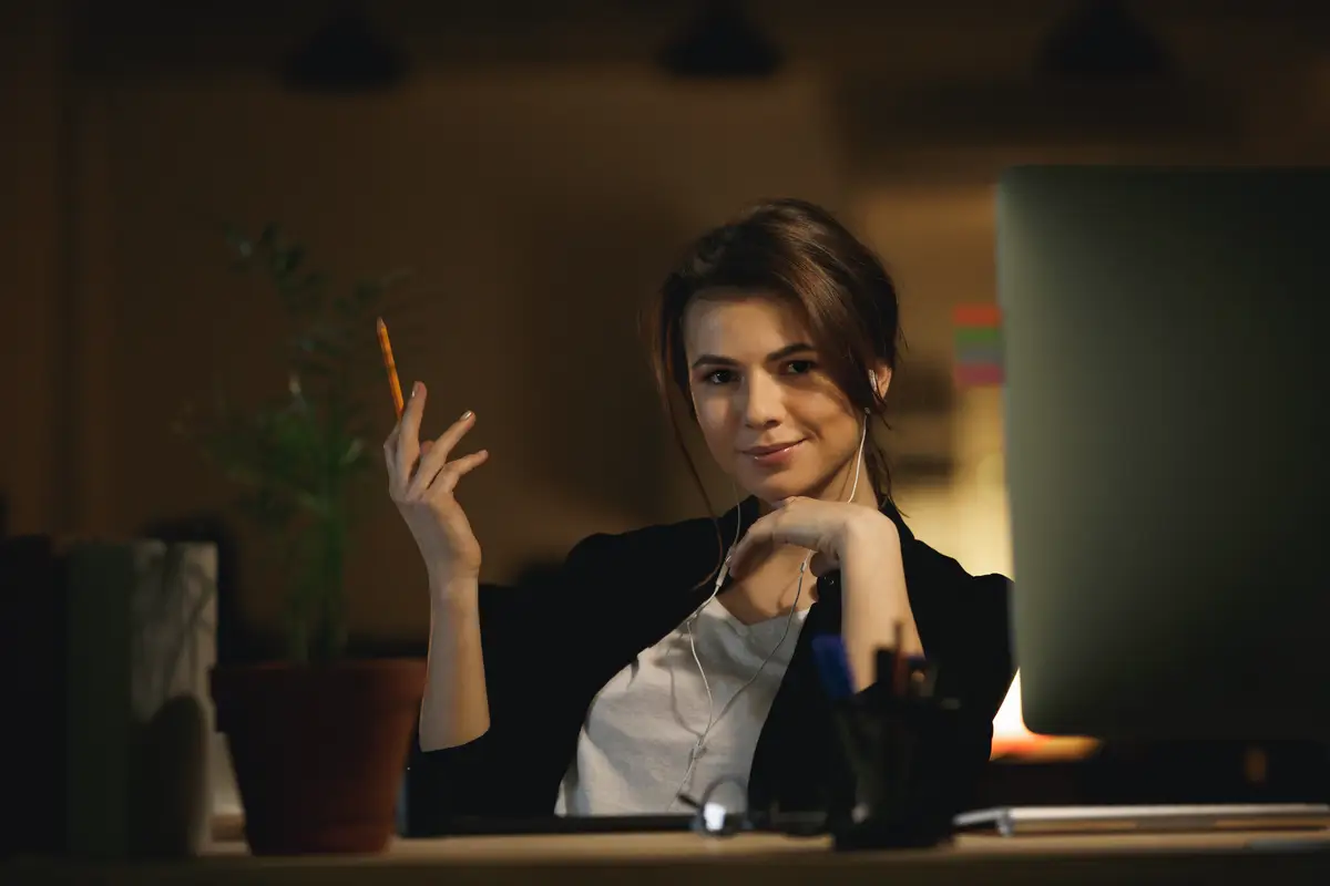 Woman with pencil posing