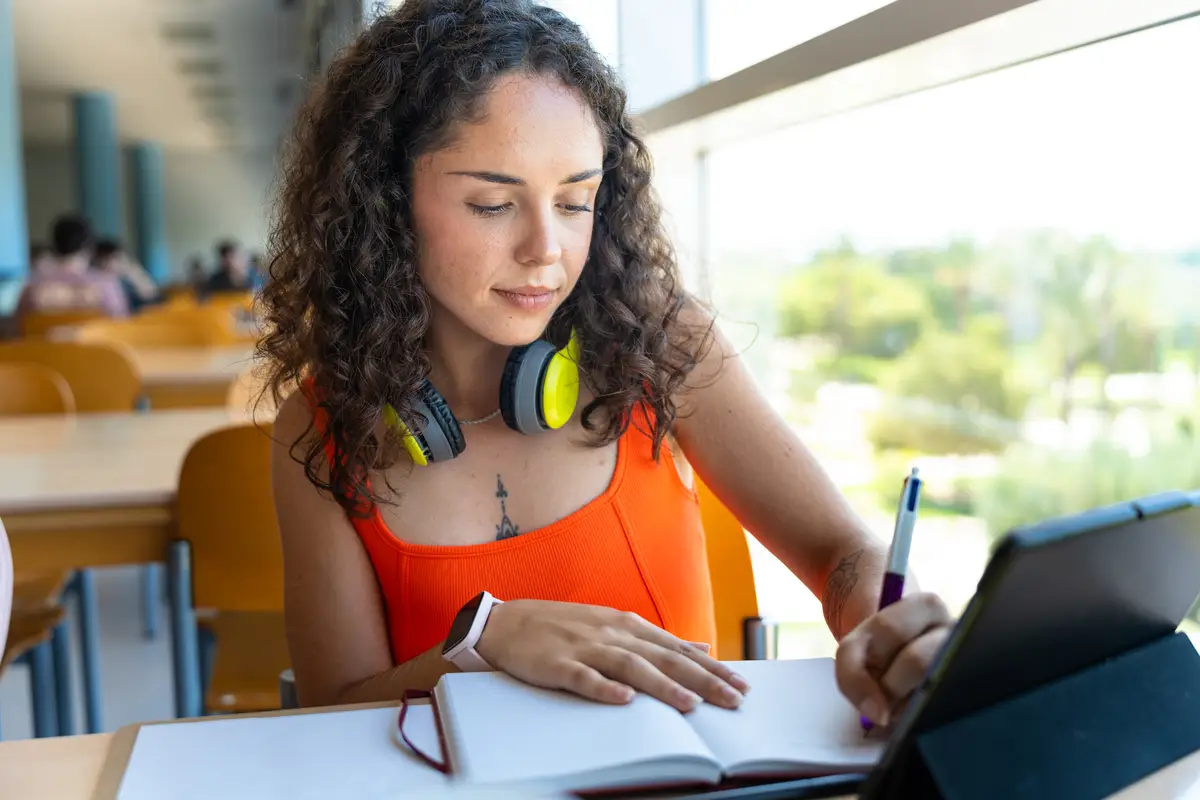 Bright library study student using technology