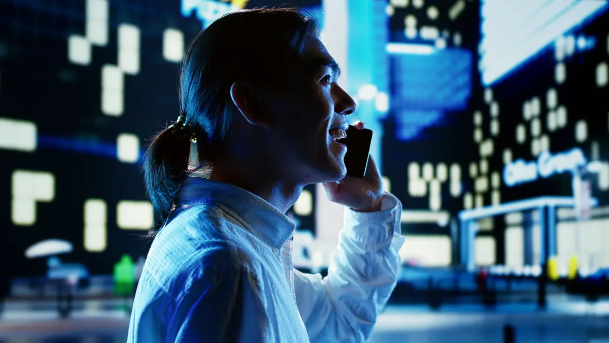 Man on the phone wandering around city