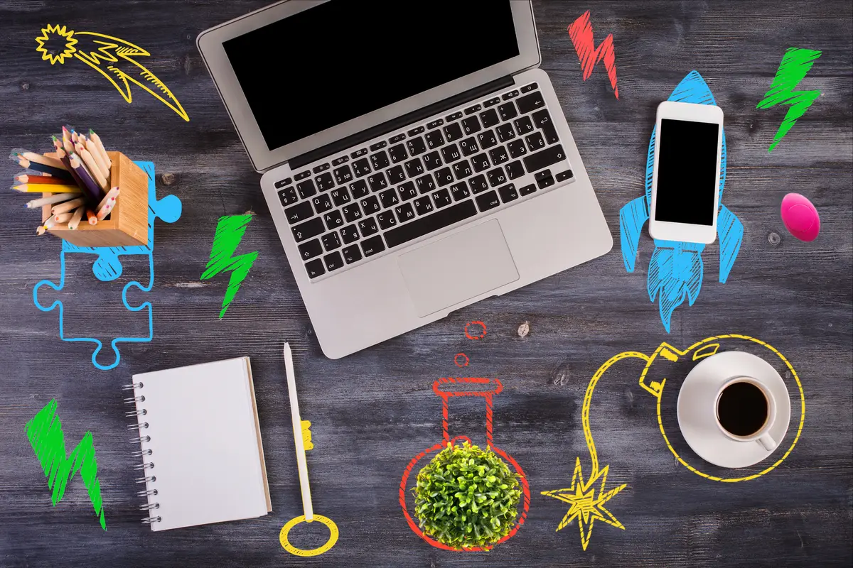 Office desktop with creative sketches