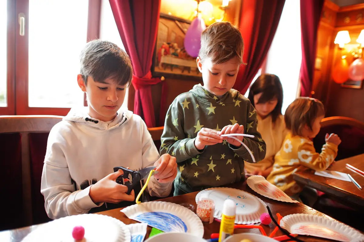 Preparing to Easter concept Kids making by hands bunny and eggs