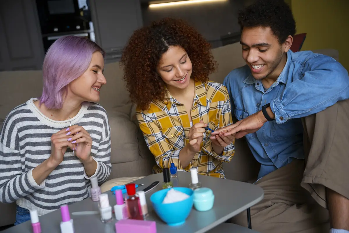 Male and female friends getting a manicure together