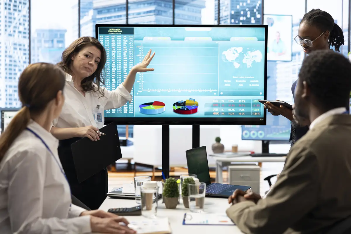 Business associates collaborating at the conference table in boardroom