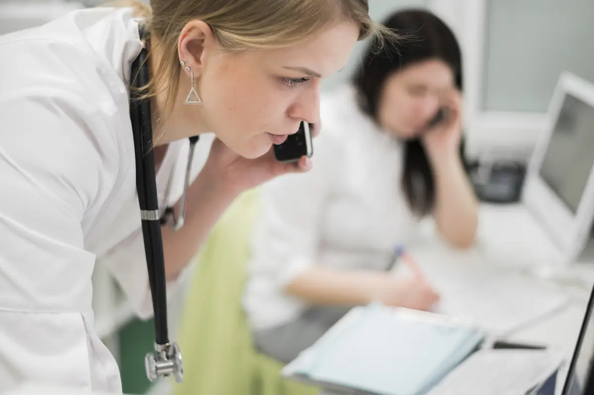 Doctor talking on the phone