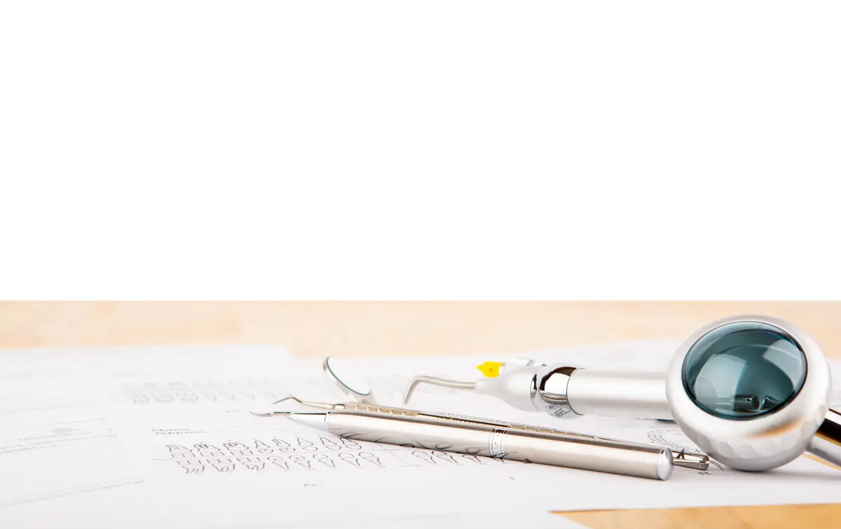 Instruments of a dentist with white background