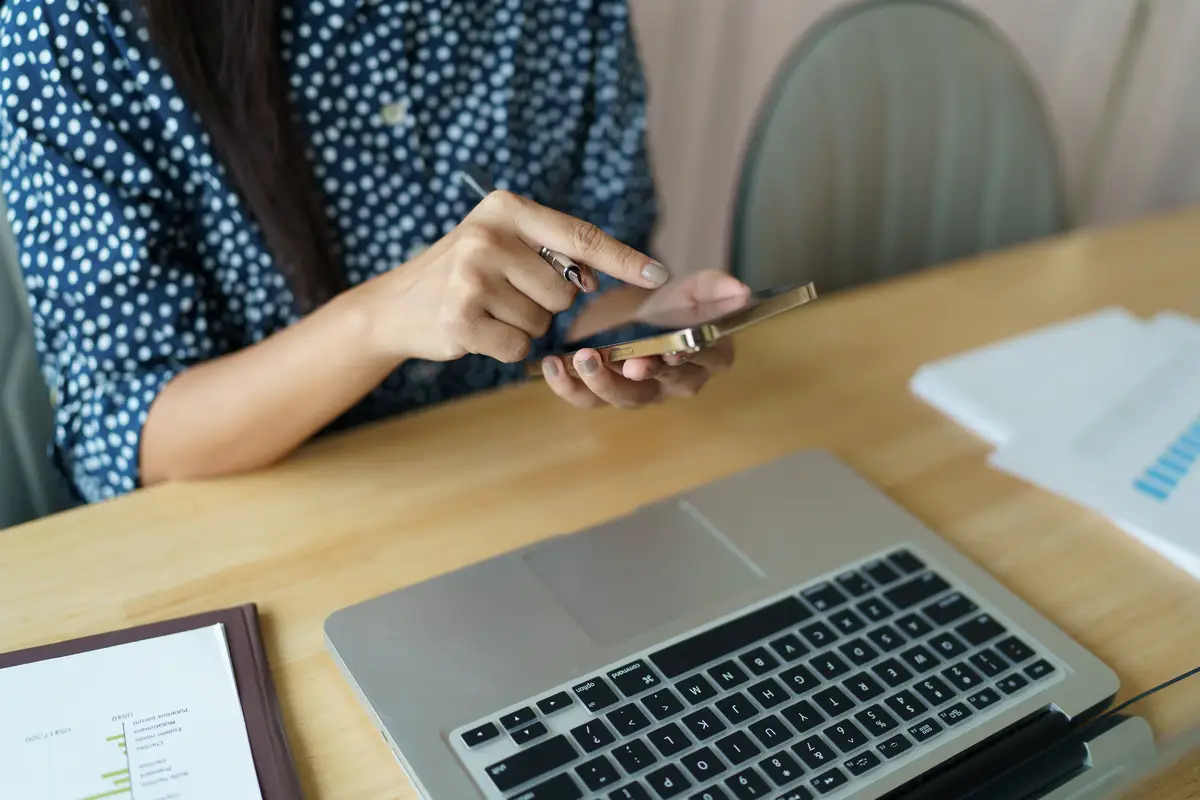 Asian woman using smartphone mobile addict spending time checking news social media cell telephone technology ecommerce concept