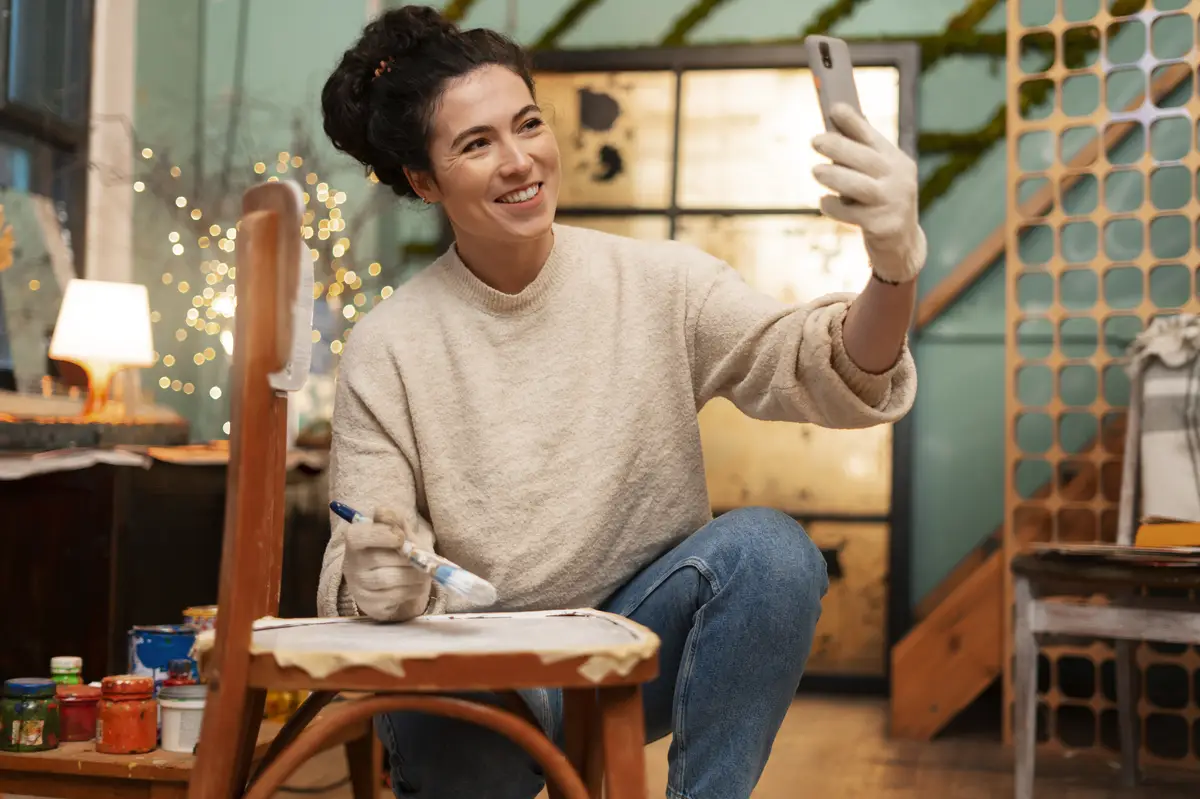 Front view woman restoring wooden furniture