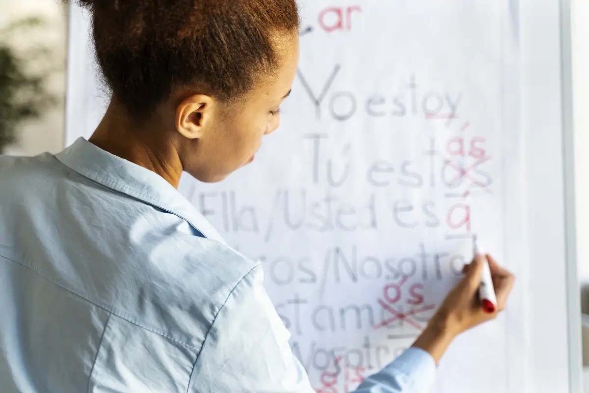 Medium shot woman correcting grammar mistakes