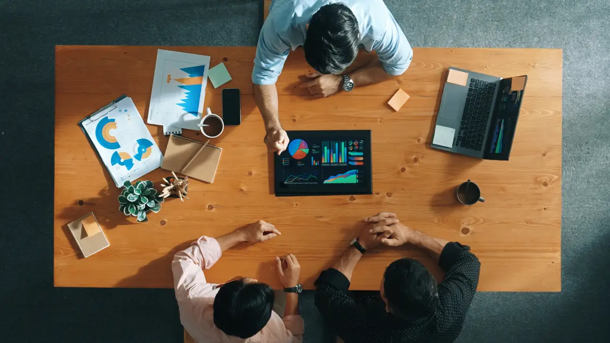 Top view of business man present financial graph to smart investor Convocation