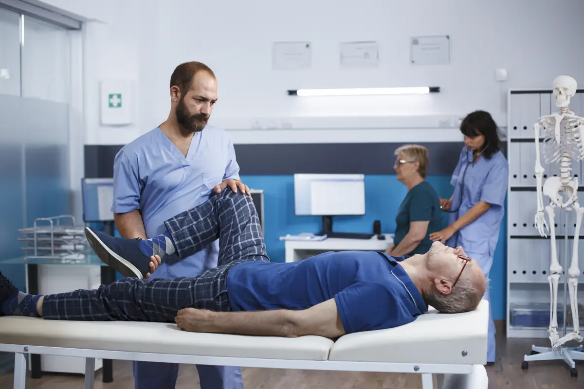 Senior man in rehabilitation clinic