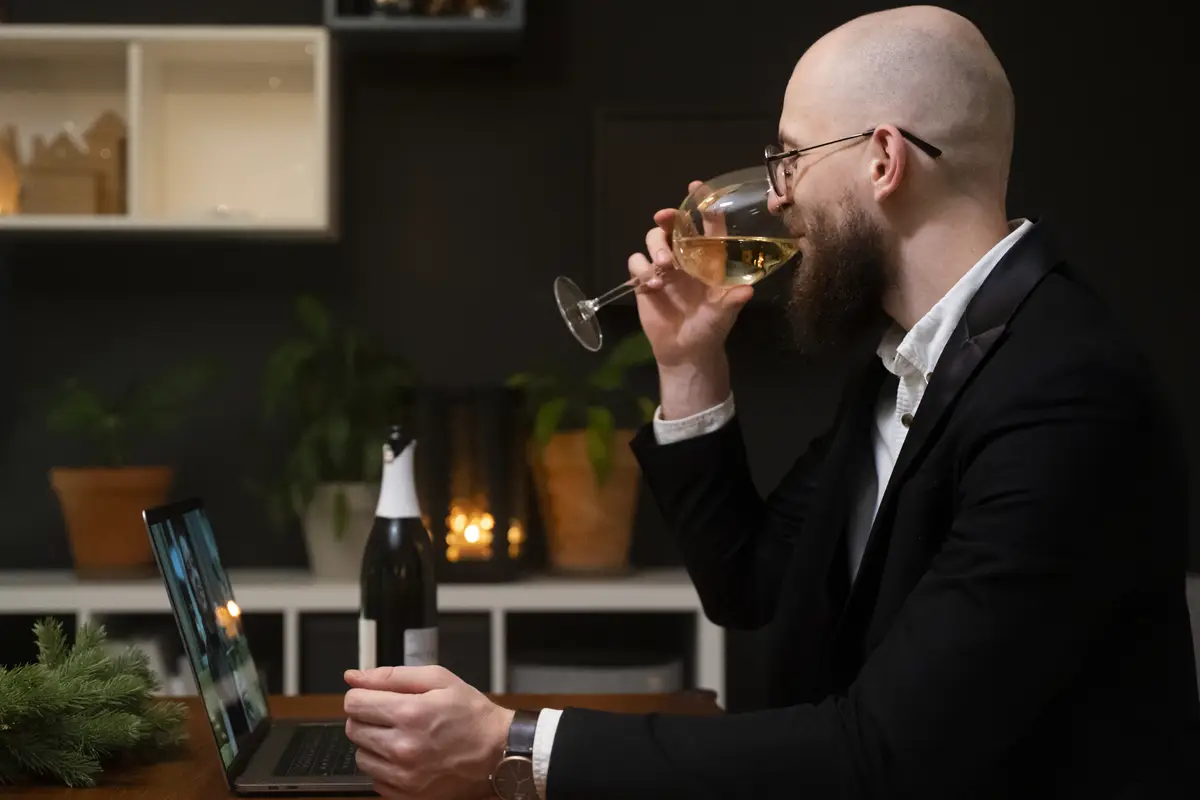 Medium shot smiley man drinking wine