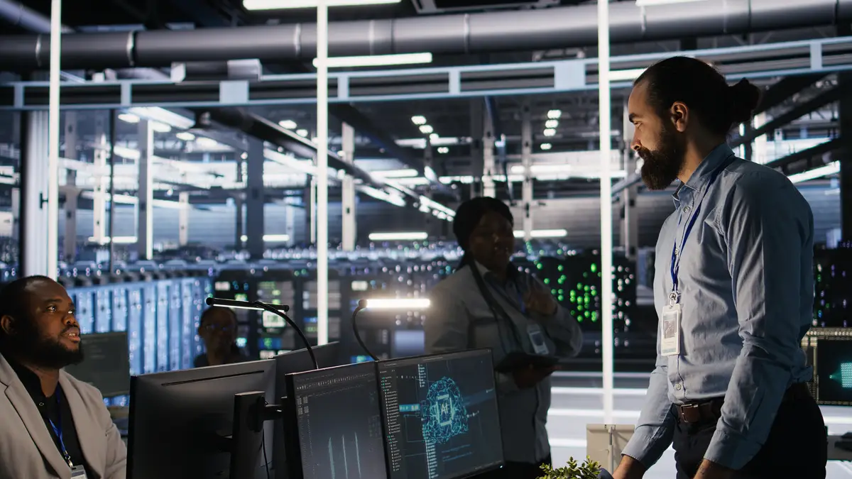 Upset data center worker packing desk after being replaced by AI