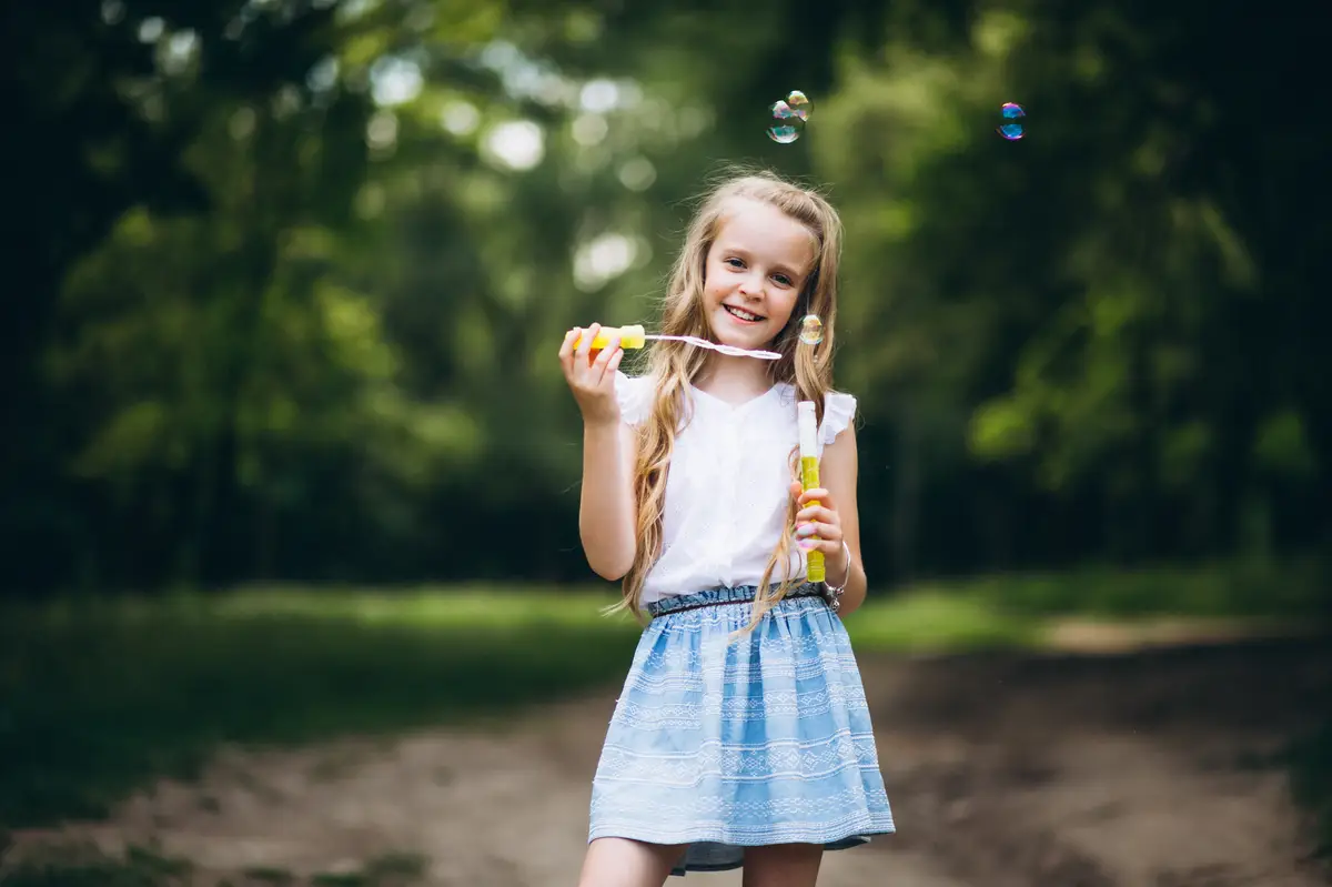 Cute little girl with bubbles