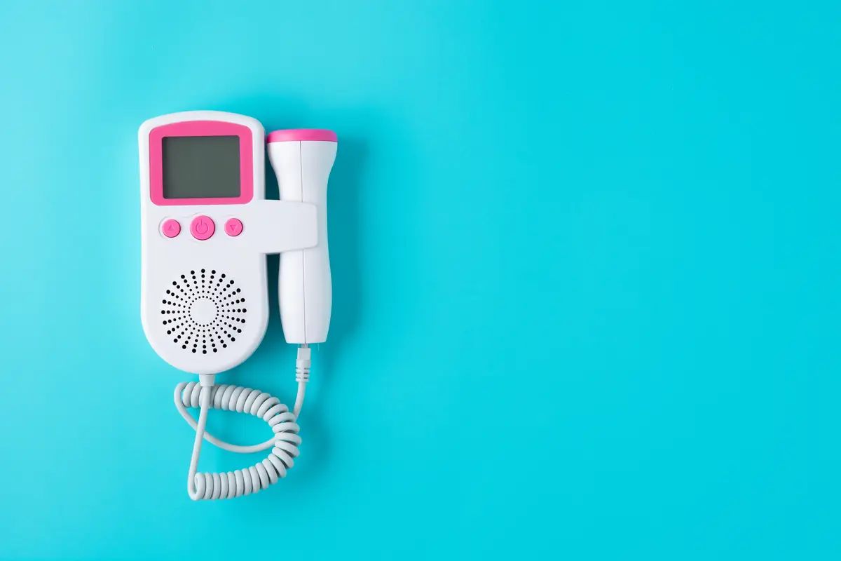 Fetal doppler on blue background