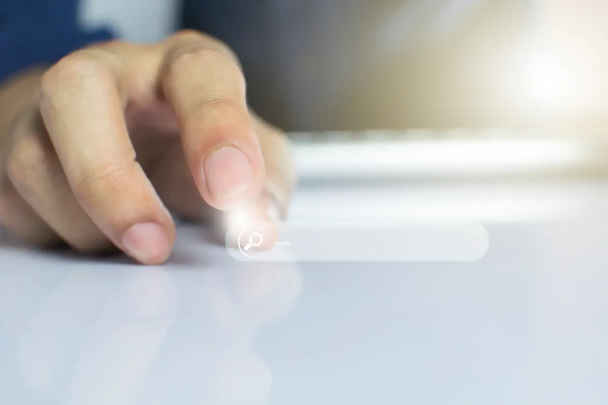 Business People Clicking wireless digital mouse with digital tablet on office table.