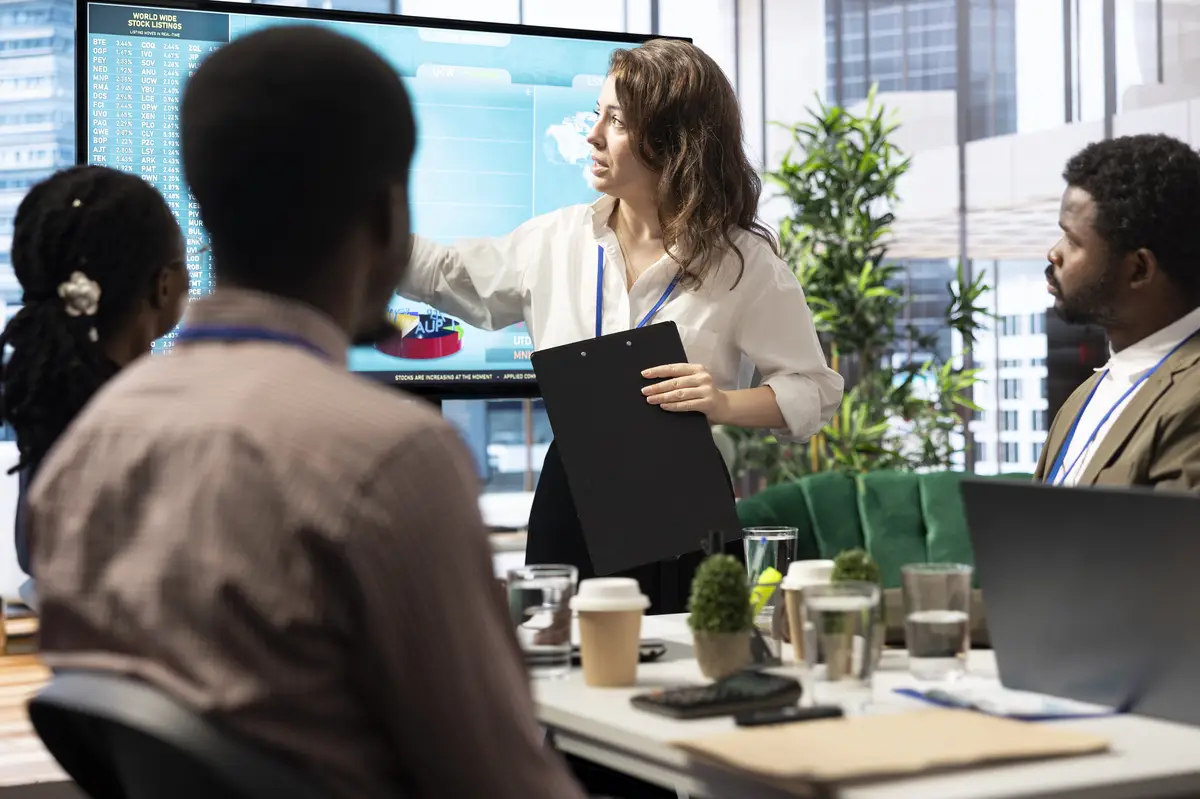 Business associates reviewing key performance indicators within the enterprise