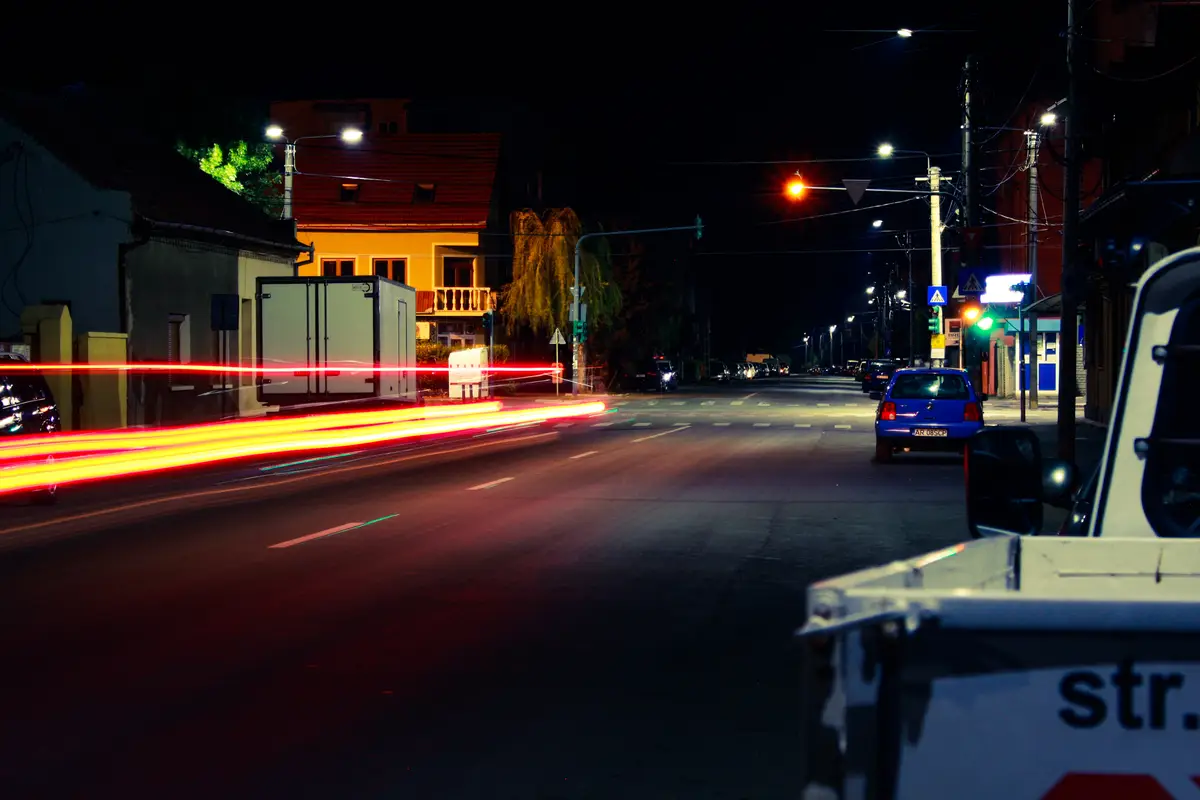 Light trails on road in city at night