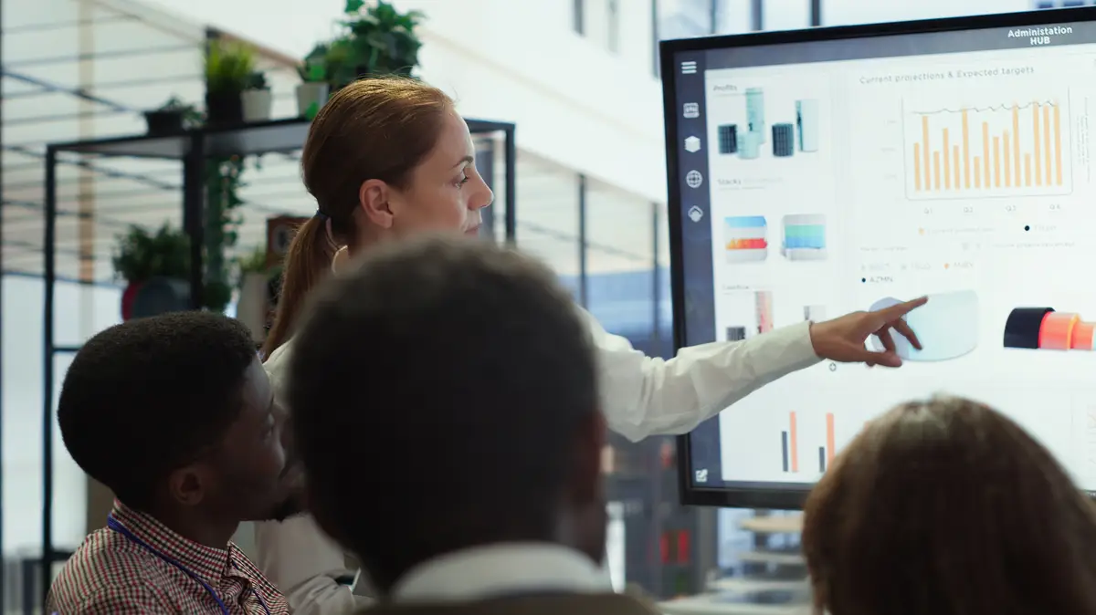 Executive board members meeting in conference room to establish growth