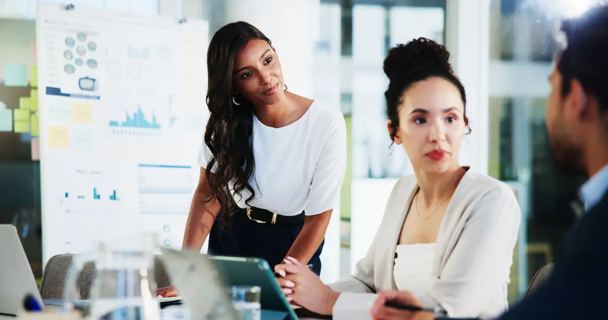 Business discussion or people with planning in presentation for financial analysis forecasting or feedback Finance analyst collaboration or meeting for budget development or listening to proposal