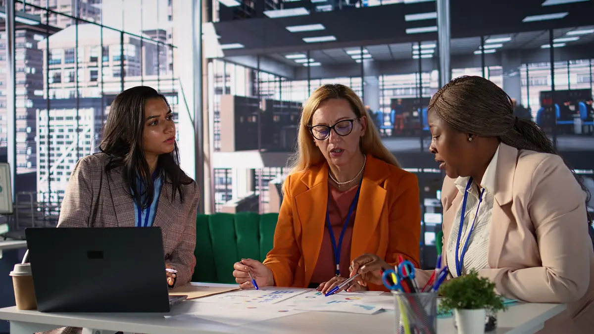 Multiethnic team of female entrepreneurs discussing business strategy