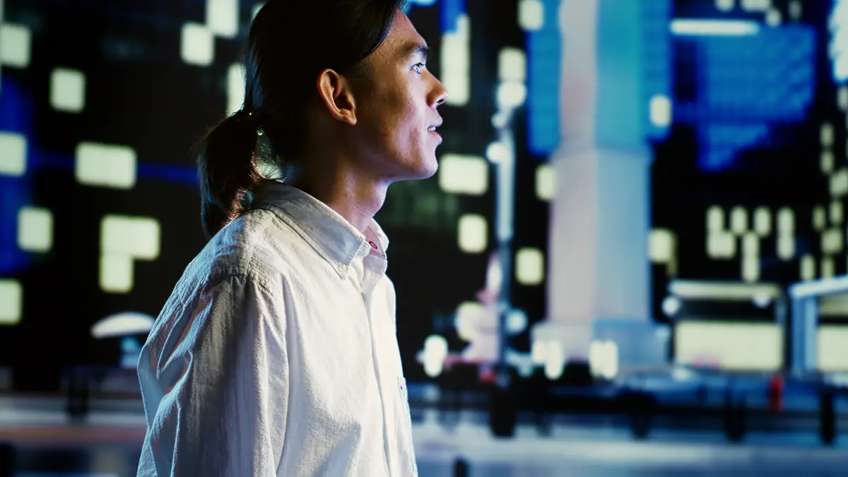 Man walks at night admiring environment