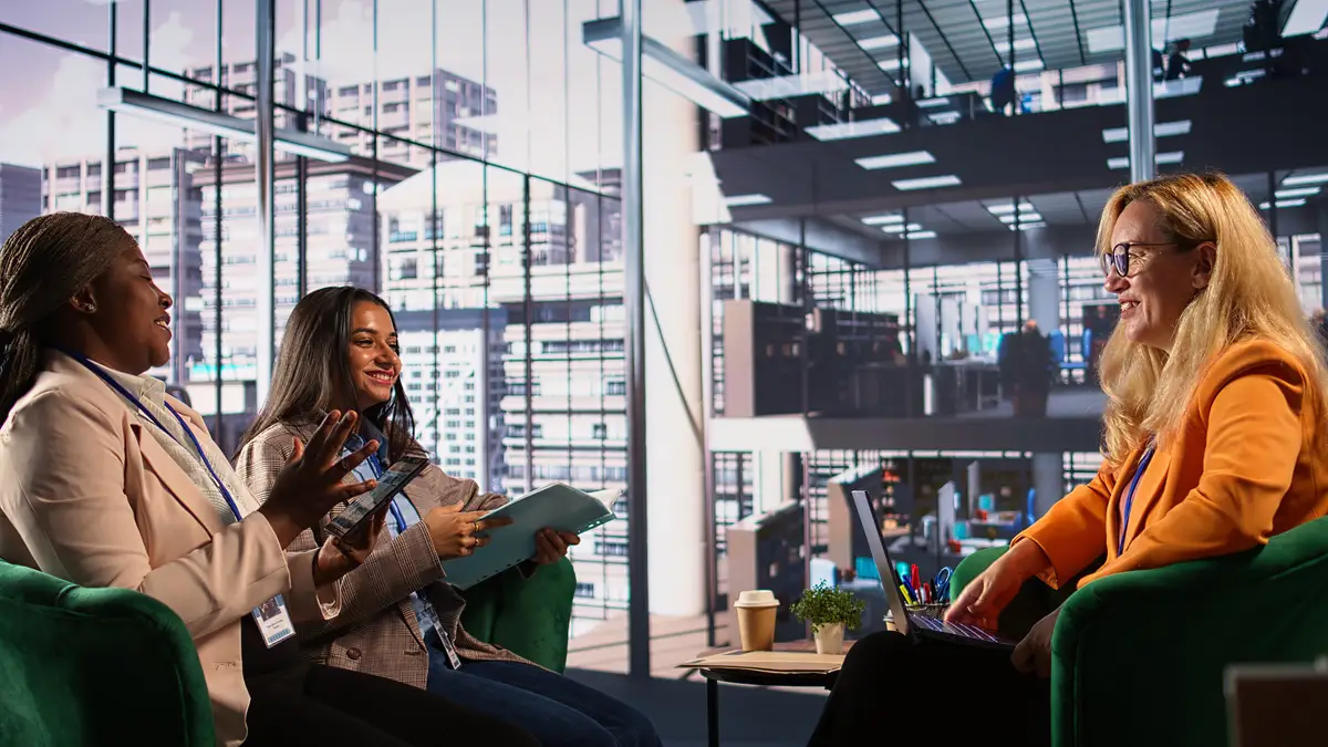 Diverse group of ambitious businesswomen engaged in a strategic meeting