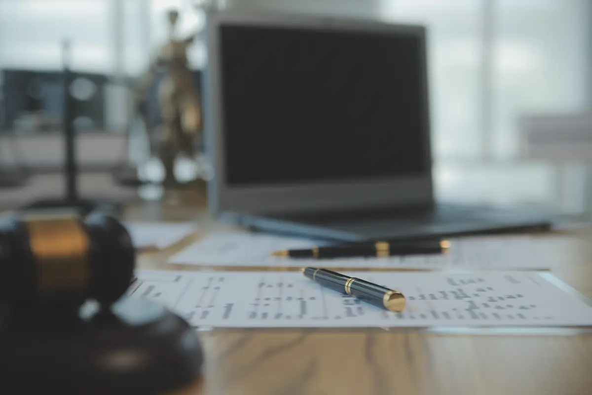 Consultation and conference of Male lawyers and professional businesswoman working and discussion having at law firm in office Concepts of law Judge gavel with scales of justice