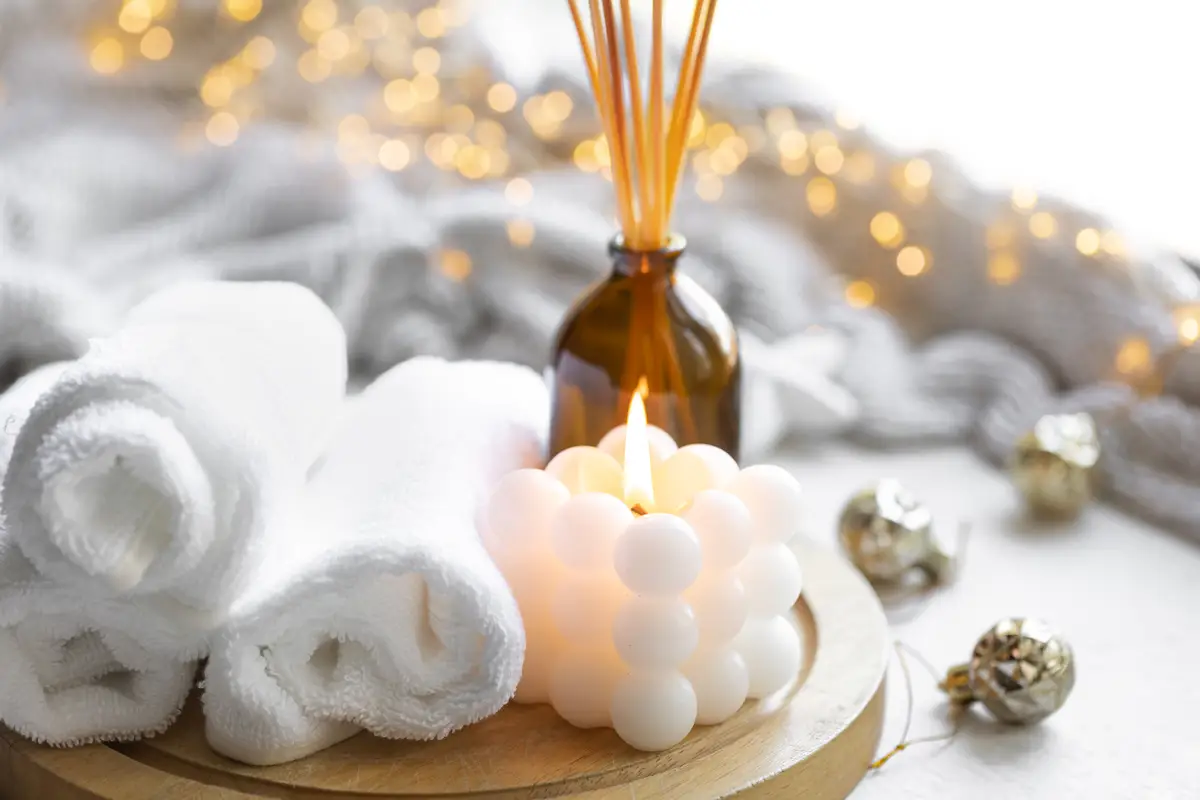 Christmas spa composition on a blurred background with bokeh lights