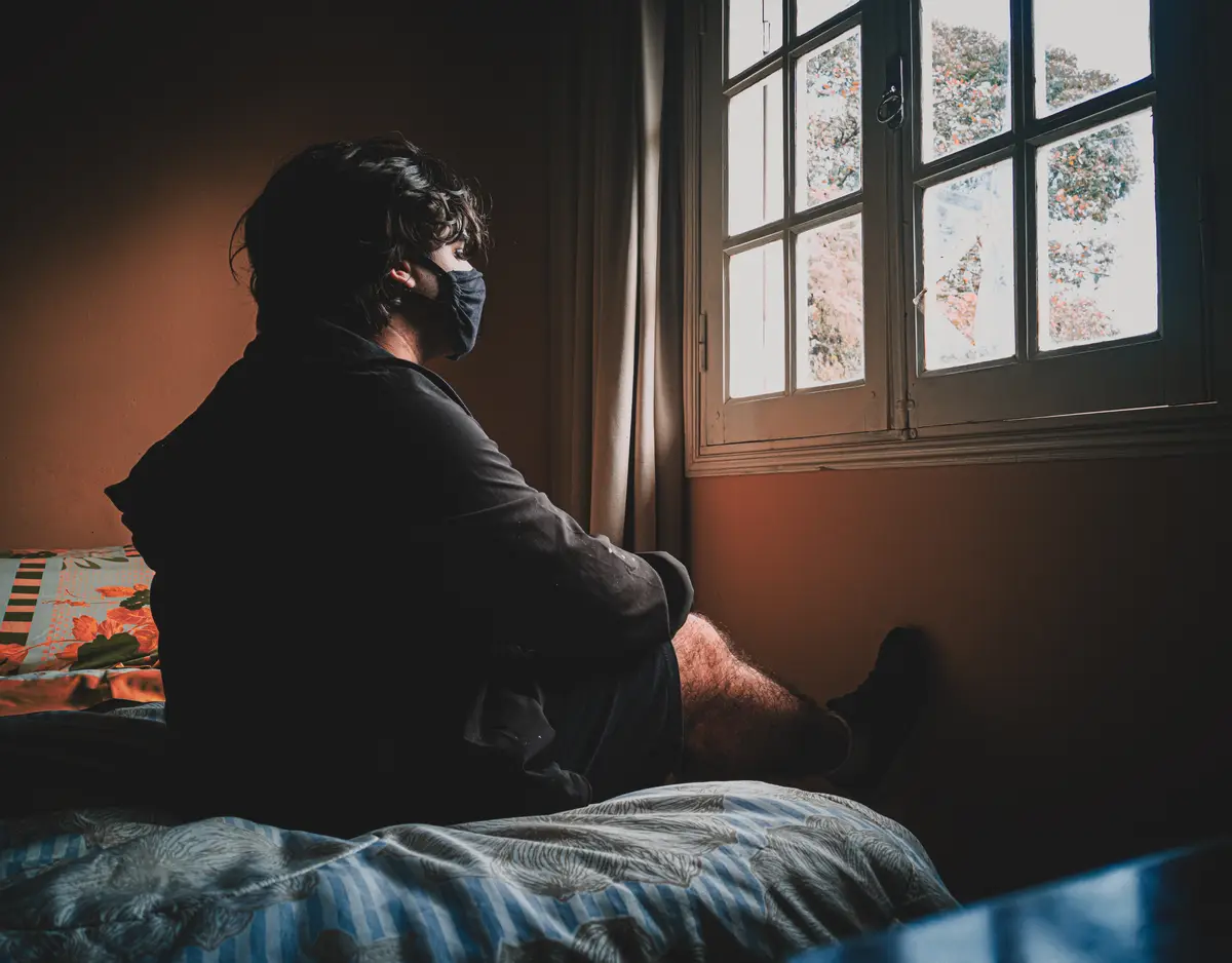 Boy looking for a window